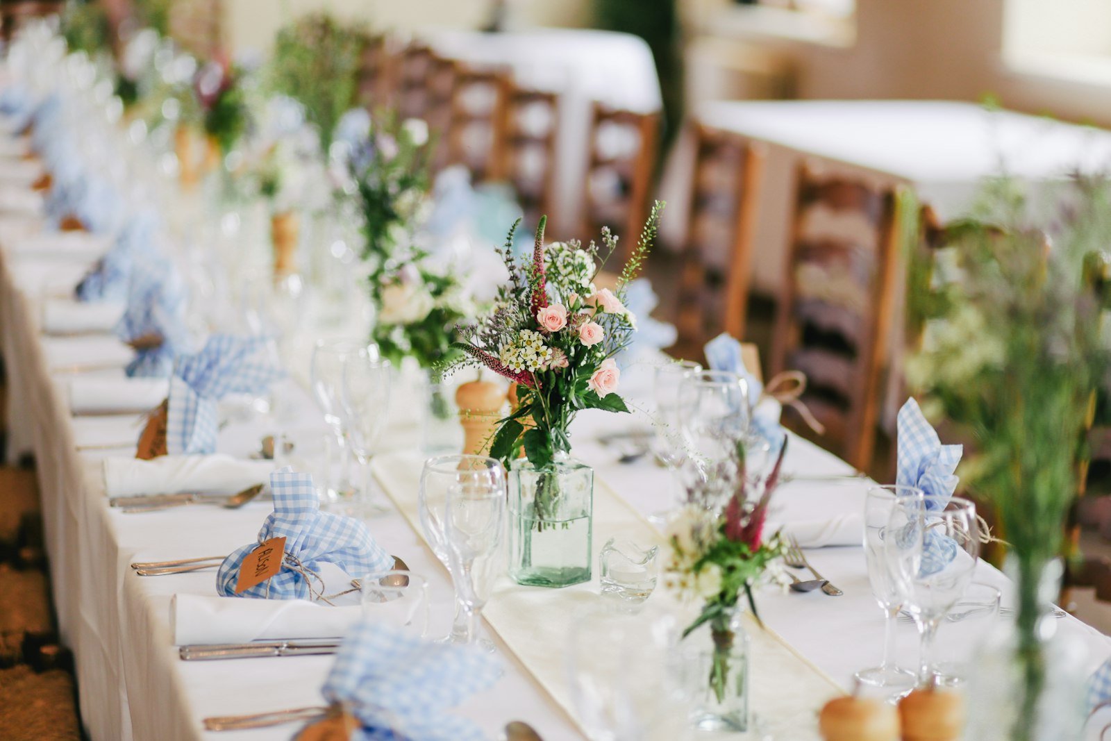 Wedding table styled with flowers and glassware